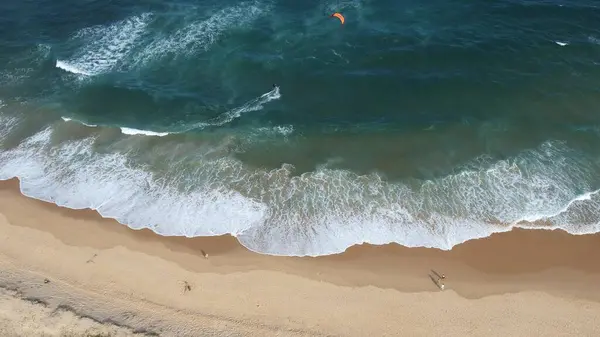 Newcastle Nobbys Beach NSW Australia Aerial View of Coastal Beach and Ocean Under Blue Sky and Rolling Waves