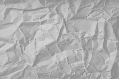 Buruşmuş kağıt veya kumaş dokusu arkaplanının dağınık kaplamasına sahip yaratıcı arkaplan.