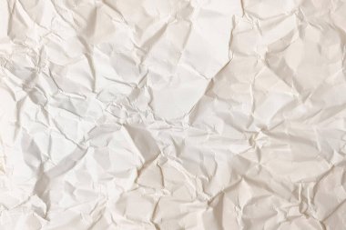 Buruşmuş kağıt veya kumaş dokusu arka plan tasarımından oluşan yaratıcı bir arka plan. Beyaz geri dönüştürülmüş kağıt poster dokusu arkaplanı.