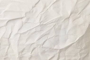 Buruşmuş kağıt veya kumaş dokusu arka plan tasarımından oluşan yaratıcı bir arka plan. Beyaz geri dönüştürülmüş kağıt poster dokusu arkaplanı.