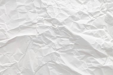 Buruşmuş kağıt veya kumaş dokusu arka plan tasarımından oluşan yaratıcı bir arka plan. Beyaz geri dönüştürülmüş kağıt poster dokusu arkaplanı.