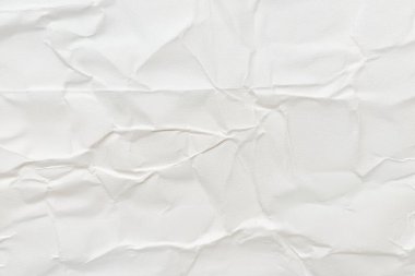 Buruşmuş kağıt veya kumaş dokusu arka plan tasarımından oluşan yaratıcı bir arka plan. Beyaz geri dönüştürülmüş kağıt poster dokusu arkaplanı.