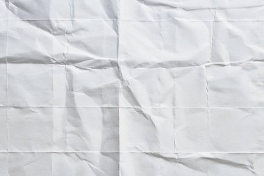 Beyaz katlanmış kağıt veya kumaş dokusu arka plan tasarımının yaratıcı arka planı. Beyaz katlanmış kağıt poster dokusu arkaplanı.