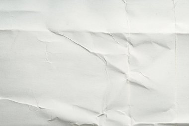 Beyaz katlanmış kağıt veya kumaş dokusu arka plan tasarımının yaratıcı arka planı. Beyaz katlanmış kağıt poster dokusu arkaplanı.