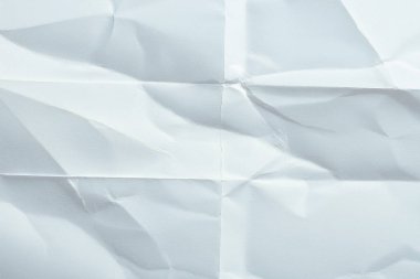 Beyaz katlanmış kağıt veya kumaş dokusu arka plan tasarımının yaratıcı arka planı. Beyaz katlanmış kağıt poster dokusu arkaplanı.