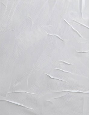 Beyaz katlanmış kağıt veya kumaş dokusu arka plan tasarımının yaratıcı arka planı. Beyaz katlanmış kağıt poster dokusu arkaplanı.