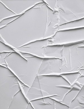 Beyaz katlanmış kağıt veya kumaş dokusu arka plan tasarımının yaratıcı arka planı. Beyaz katlanmış kağıt poster dokusu arkaplanı.