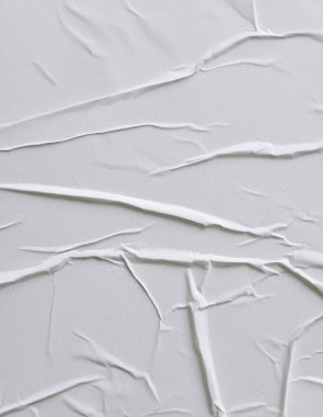 Beyaz katlanmış kağıt veya kumaş dokusu arka plan tasarımının yaratıcı arka planı. Beyaz katlanmış kağıt poster dokusu arkaplanı.