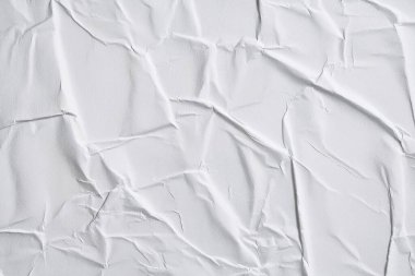 Beyaz katlanmış kağıt veya kumaş dokusu arka plan tasarımının yaratıcı arka planı. Beyaz katlanmış kağıt poster dokusu arkaplanı.
