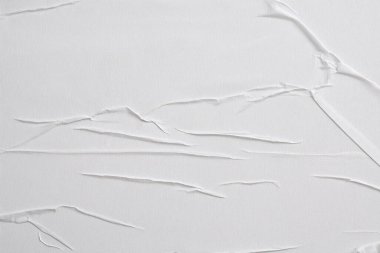 Beyaz katlanmış kağıt veya kumaş dokusu arka plan tasarımının yaratıcı arka planı. Beyaz katlanmış kağıt poster dokusu arkaplanı.