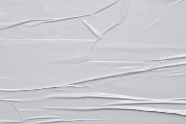 Beyaz katlanmış kağıt veya kumaş dokusu arka plan tasarımının yaratıcı arka planı. Beyaz katlanmış kağıt poster dokusu arkaplanı.