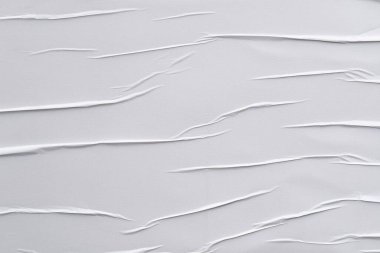 Beyaz katlanmış kağıt veya kumaş dokusu arka plan tasarımının yaratıcı arka planı. Beyaz katlanmış kağıt poster dokusu arkaplanı.