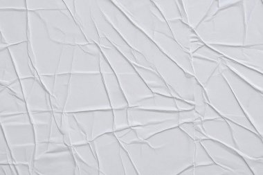 Beyaz katlanmış kağıt veya kumaş dokusu arka plan tasarımının yaratıcı arka planı. Beyaz katlanmış kağıt poster dokusu arkaplanı.