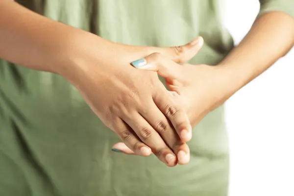 cropped shot of a women's hand pain due to carpal tunnel syndrome