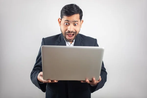 Indian Man Wearing Suit Looking Laptop Screen Surprised Expression Royalty Free Stock Images
