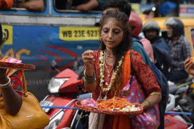 June 28, 2023, Kolkata, India. Thousands of Hindu devotees celebrate the Ulta-Rath Yatra (Journey of chariots with deities of Jagannath, Balaram, and Subhadra) that organised by the International Society for Krishna Consciousness (ISKCON) clipart