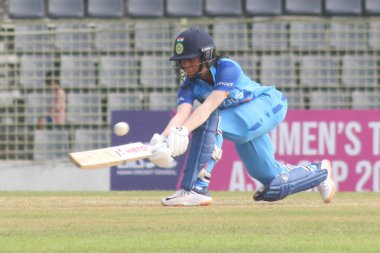 October 7, 2022, Sylhet, Bangladesh: Jemimah Rodrigues of Indian Women Team leans into a drive against Bangladesh Women Team during Womens Cricket T20 Asia Cup 2022 at Sylhet International Cricket Stadium clipart