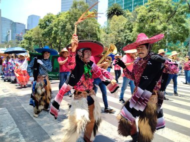 August 9, 2023, Mexico City, Mexico: Various indigenous organizations participating in the Mega Calenda Parade on the International Day of Indigenous Peoples on Reforma avenue in Mexico City. on August 9, 2023 in Mexico City, Mexico clipart