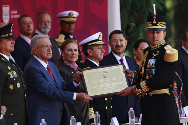 Mexico City, Mexico - September 13, 2023 : President of Mexico Andres Manuel Lopez Obrador deliveries recognition to a cadet during the 176th Anniversary of the Heroic Deed of the Children Heroes of Chapultepec, at the Altar to the Homeland