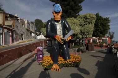 October 20, 2023, State of Puebla, Mexico: Monumental catrinas with various representations of characters adorn fields and places in the municipality of Atlixco in the state of Puebla clipart