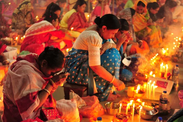 stock image 04 November 2023 Sylhet-Bangladesh: Hindu devotees sit together on the floor of a temple to observe the Rakher Upobash festival in Loknath Temple in Sylhet, Bangladesh