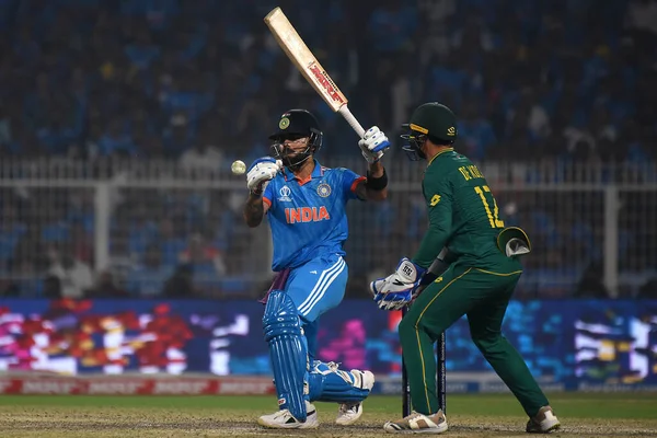 stock image October 5, Kolkata,India: Virat Kohli of India,  hits the ball  during the ICC Men's Cricket World Cup match between India and South Africa in Kolkata, India, Sunday, Nov. 5, 2023 in Kolkata, India