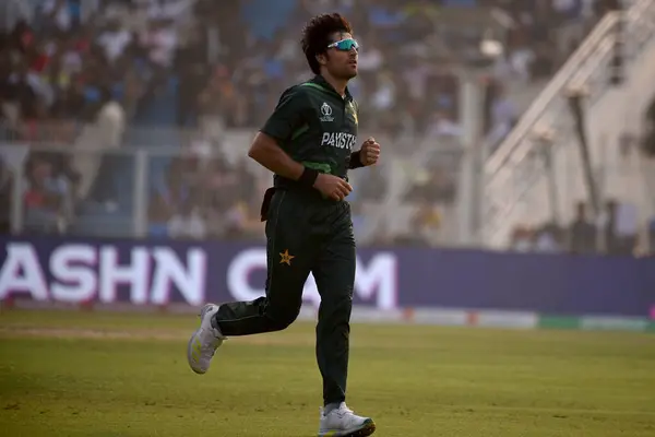 stock image November 11, Kolkata, India: Mohammad Wasim of Pakistan  runs during the 2023 ICC Men's Cricket World Cup match between England and Pakistan at the Eden Gardens Stadium