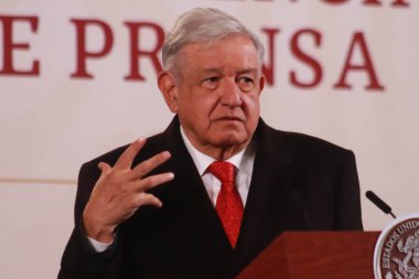 December 13, 2023 in Mexico City, Mexico: Mexican President, Andres Manuel Lopez Obrador speaks during the briefing conference in front of media at the National Palace clipart