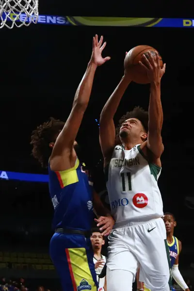 stock image January 12, 2024 in Mexico City, Mexico: Stephen Thompson (11) of Wisconsin Herd  goes to the basket  during the   the NBA G league match, at the Mexico City Arena on January 12, 2024. In Mexico City . 