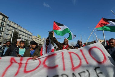 March 15, 2024 , Naples , Italy : Demonstrators take part during a protest to  took place to call out loud to stop the genocide of the Palestinian people clipart