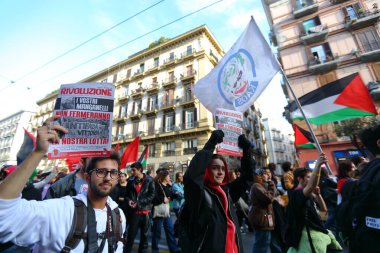 March 15, 2024 , Naples , Italy : Demonstrators take part during a protest to  took place to call out loud to stop the genocide of the Palestinian people clipart