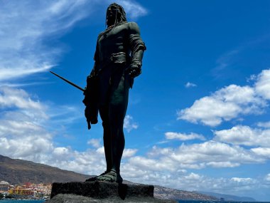 Candelaria, Spain - 16.05.2023: Statues of the guanches are in the Plaza de la Patrona de Canarias. . High quality photo clipart