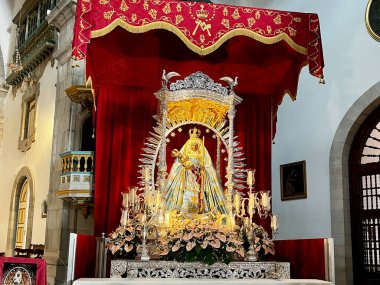 Candelaria, Tenerife, Spain - 16.05.2023: Interior of the Basilica of the Royal Marian Shrine of Our Lady of Candelaria and altar. High quality photo clipart