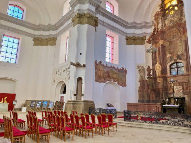 The interior of the church of the Annunciation in monastery Marianska Tynice, of the Northern Plzen Region. Red chairs. High quality photo clipart