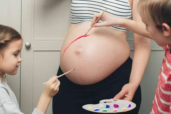 Baby Birth Expecting Time Belly Painting Happy Children Pregnant Mom — 图库照片