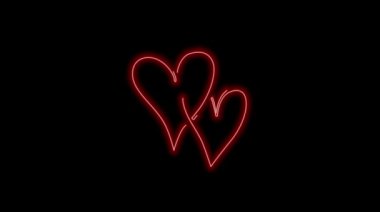 kırmızı kalp neon ışıklardan yapılmış.