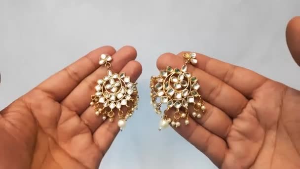 Woman Hand Golden Earrings Pearls — Stock Video