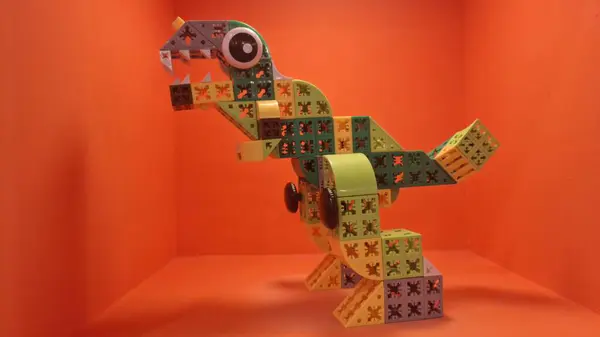 Tahta arka planı olan oyuncak timsah.