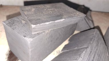 a closeup shot of a wooden board with a blurred background