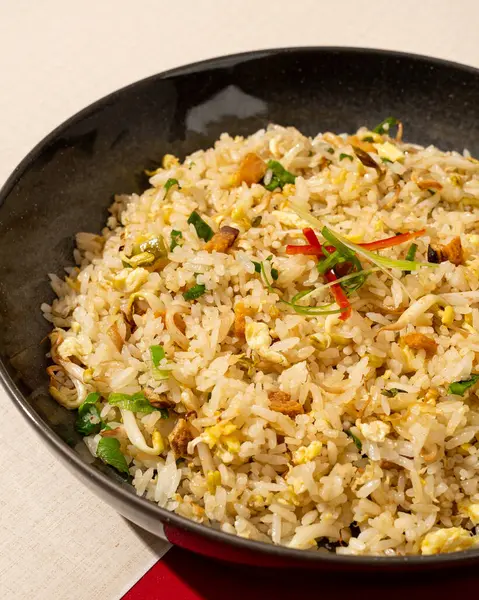 Salted fish fried rice is a dish of rice fried in a pan which produces a different taste because it is mixed with spices and salted fish.