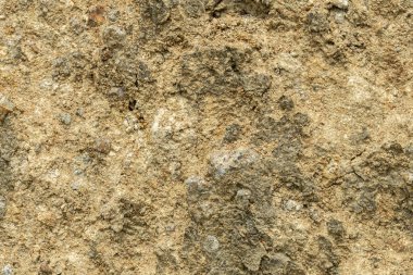 Çatlak Dünya. Sıcak turuncu bir tonda çatlamış, kuru toprak desenleri olan kurak bir arazi.