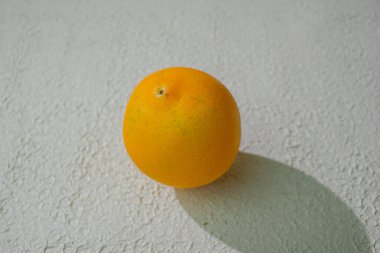 A vibrant orange isolated on a clean white background, representing freshness, health, and natural citrus goodness, ideal for food related visuals clipart