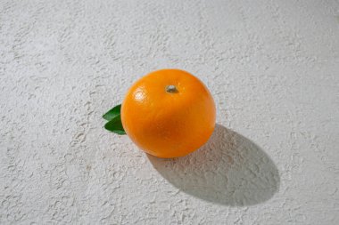 A vibrant orange isolated on a clean white background, representing freshness, health, and natural citrus goodness, ideal for food related visuals clipart