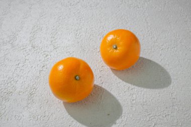 A vibrant orange isolated on a clean white background, representing freshness, health, and natural citrus goodness, ideal for food related visuals clipart