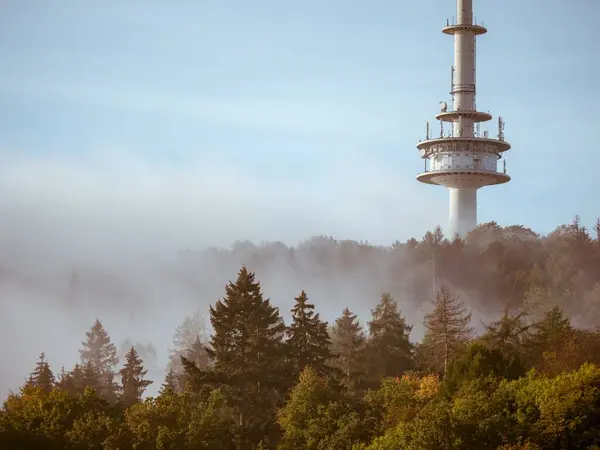 stock image The Bielefeld TV tower in the fog in the middle of the Teutoburg Forest