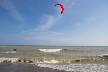 Toronto Ontario Canada Person kiteboarding in Toronto at Kew beach on Lake Ontario on a windy day 