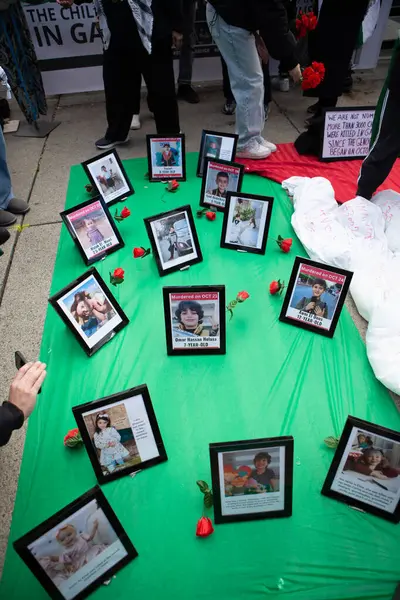 stock image Pictures of young victims of the War in Gaza at a Palestinian Protest against the war in Gaza in Toronto Ontario Canada