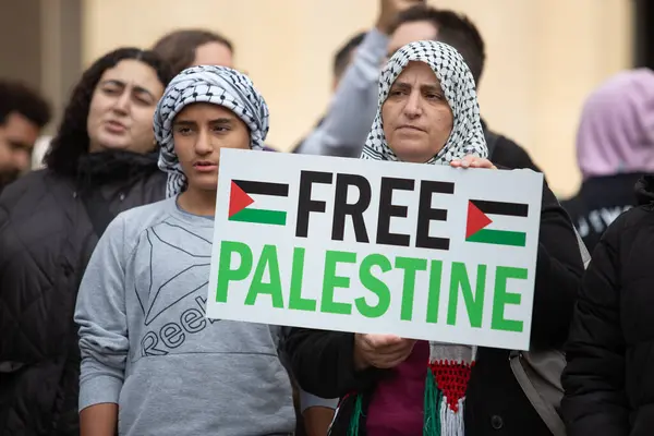 stock image Toronto Ontario Canada  Woman holds up a sign saying Free Palestine at a Palestinian demonstration Toronto Canada against the war in Gaza