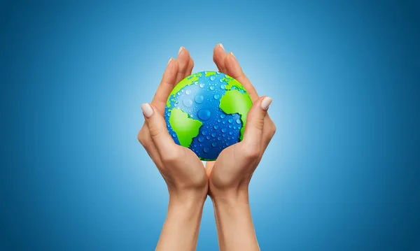 Two hands holding the earth on blue color gradient background. hand holding world map.