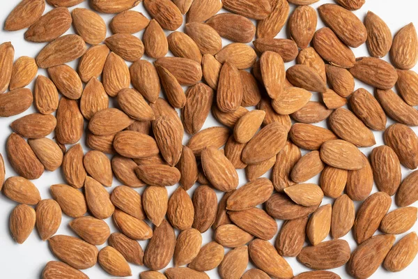 Shelled Raw Sicilian Almonds Texture White Background — Stock Photo, Image
